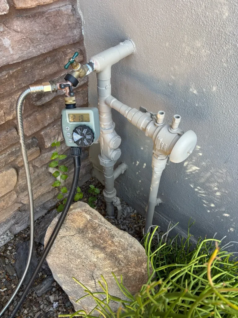 Main water line and old pressure regulator before service